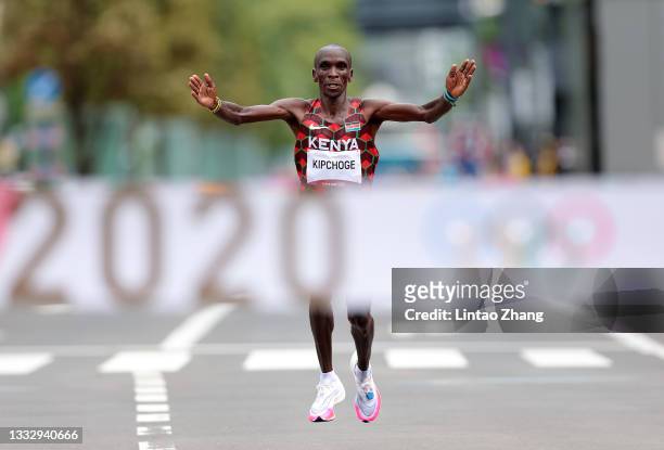 Eliud Kipchoge of Team Kenya is about to cross the finish line during the Men's Marathon Final on day sixteen of the Tokyo 2020 Olympic Games at...