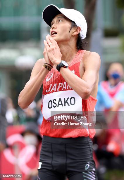 Suguru Osako of Team Japan reacts after coming in sixth in the Men's Marathon Final on day sixteen of the Tokyo 2020 Olympic Games at Sapporo Odori...