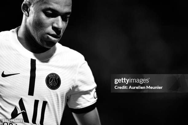 Kylian Mbappe of Paris Saint-Germain looks on during the Ligue 1 football match between Troyes and Paris at Stade de l'Aube on August 07, 2021 in...