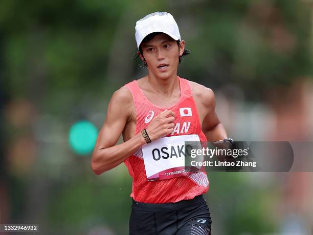 Suguru Osako of Team Japan competes in the Men's Marathon Final on day sixteen of the Tokyo 2020 Olympic Games at Sapporo Odori Park on August 08,...