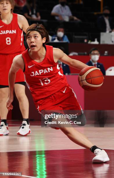 Rui Machida of Team Japan drives to the basket against Team United States during the first half of the Women's Basketball final game on day sixteen...