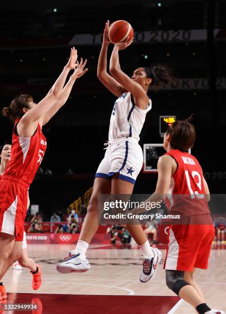 Ja Wilson of Team United States takes a jump shot against Yuki Miyazawa of Team Japan during the first half of the Women's Basketball final game on...