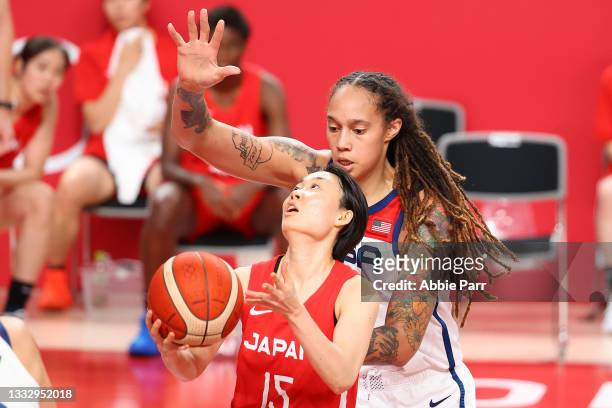 Nako Motohashi of Team Japan looks to shoot against Brittney Griner of Team United States during the second quarter during the women's gold medal...