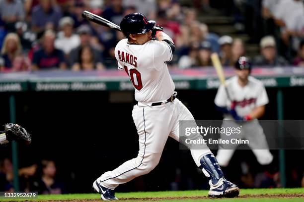 Wilson Ramos of the Cleveland Indians hits a solo home run in the ninth inning during their game against the Detroit Tigers at Progressive Field on...