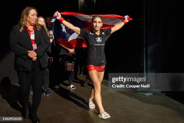 Tecia Torres walks out prior to her women's strawweight bout during the UFC 265 event at Toyota Center on August 07, 2021 in Houston, Texas.