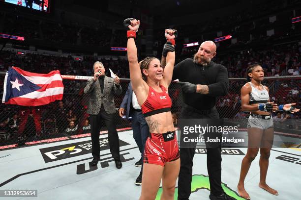 Tecia Torres reacts after defeating Angela Hill in their women's strawweight bout during the UFC 265 event at Toyota Center on August 07, 2021 in...