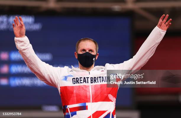 Gold medalist Jason Kenny of Team Great Britain, poses on the podium during the medal ceremony after the Men's Keirin final of the track cycling on...