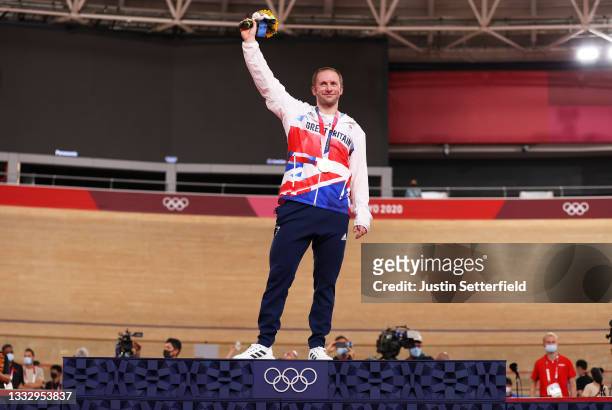 Gold medalist Jason Kenny of Team Great Britain, poses on the podium during the medal ceremony after the Men's Keirin final of the track cycling on...