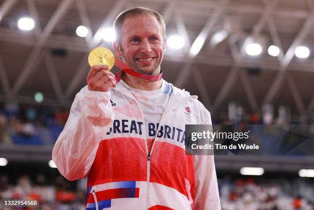 Gold medalist Jason Kenny of Team Great Britain, poses on the podium during the medal ceremony after the Men's Keirin final of the track cycling on...