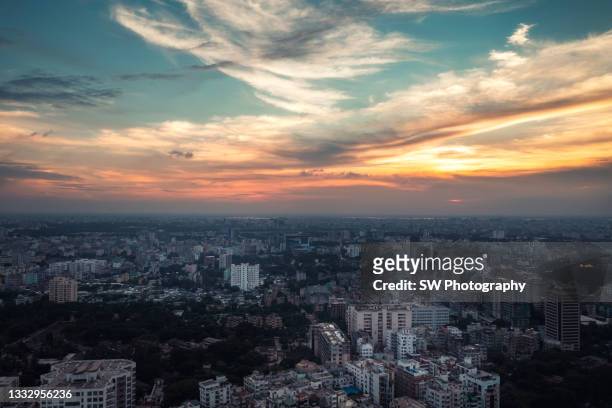 magnificent sunset drone photo of the cityscape of dhaka, bangladesh - bangladesh business stock pictures, royalty-free photos & images