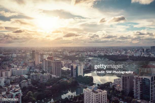 magnificent sunset drone view of the cityscape of dhaka, bangladesh - cultura del bangladesh foto e immagini stock