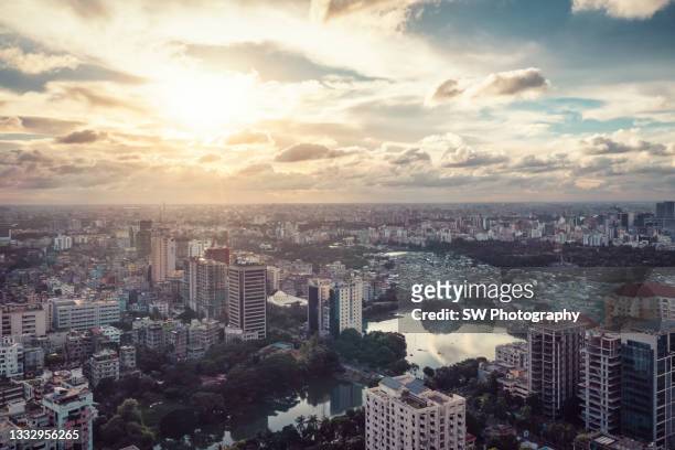 magnificent sunset drone view of the cityscape of dhaka, bangladesh - bangladesh stock pictures, royalty-free photos & images