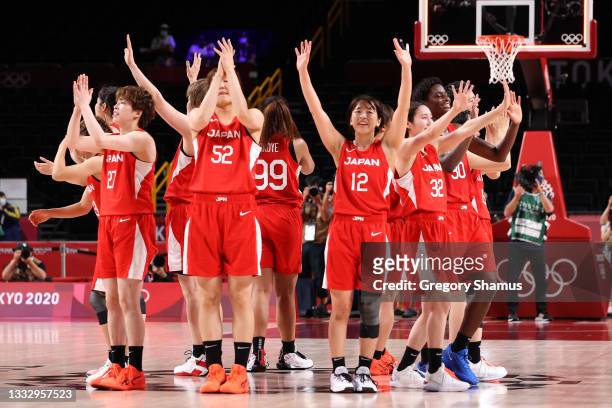 Team Japan acknowledges the crowd after their defeat to Team United States in the Women’s Basketball final game to win the silver medal on day...