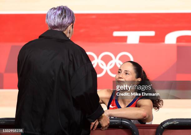 Megan Rapinoe congratulates Sue Bird of Team United States after the United States' win over Japan in the Women's Basketball final game on day...