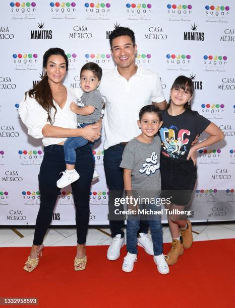 Courtney Laine Mazza, Santino Lopez, Mario Lopez, Dominic Lopez and Gia Francesca Lopez attend and event to introduce the Mamitas Hurricane Goblet...