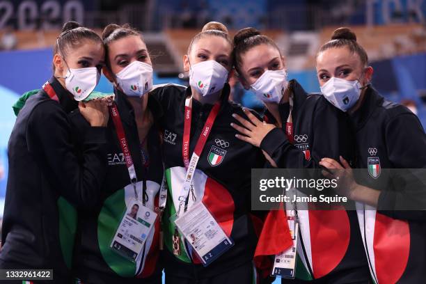 Team Italy poses after winning the bronze medal during the Group All-Around Final at Ariake Gymnastics Centre on August 08, 2021 in Tokyo, Japan.