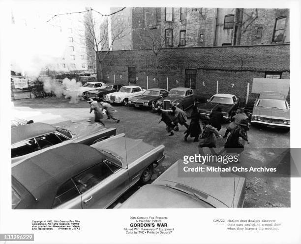 Harlem drug dealers discover their cars exploding around them when they leave a big meeting in a scene from the film 'Gordon's War', 1973.