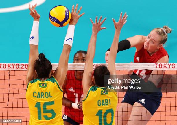 Michelle Bartsch-Hackley of Team United States competes against Gabriela Braga Guimaraes and Ana Carolina da Silva of Team Brazil during the Women's...