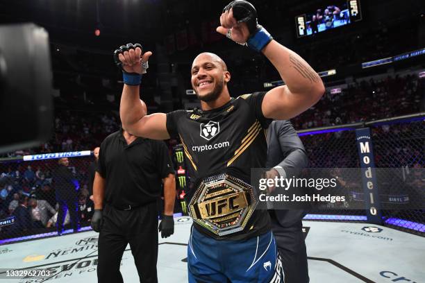 Ciryl Gane of France reacts after defeating Derrick Lewis in their interim heavyweight title bout during the UFC 265 event at Toyota Center on August...