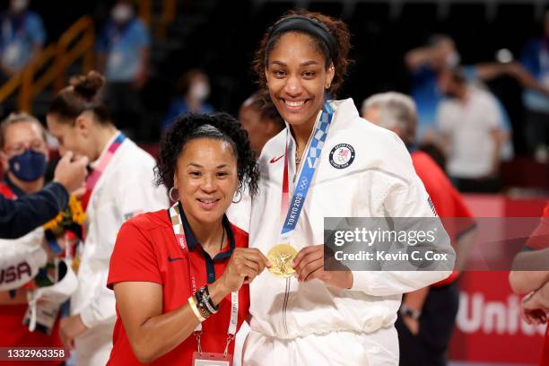 Team United States Head Coach Dawn Staley and A'Ja Wilson pose for photographs with their gold medals during the Women's Basketball medal ceremony on...