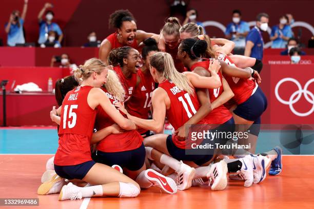 Players of Team United States react after they defeated Team Brazil during the Women's Gold Medal Match on day sixteen of the Tokyo 2020 Olympic...