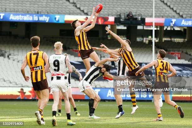 Mitchell Lewis of the Hawks attempts to mark the ball during the round 21 AFL match between Hawthorn Hawks and Collingwood Magpies at the Melbourne...