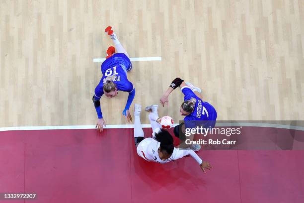 Pauletta Foppa of Team France shoots at goal while under pressure from Kseniia Makeeva and Daria Dmitrieva of Team ROC during the Women's Gold Medal...