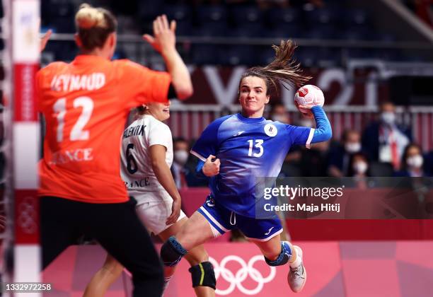 Anna Vyakhireva of Team ROC shoots at goal as Amandine Leynaud of Team France looks to save during the Women's Gold Medal handball match between ROC...