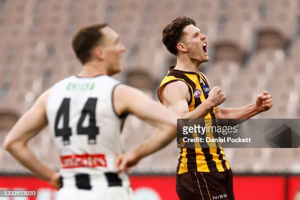 Jacob Koschitzke of the Hawks celebrates a goal during the round 21 AFL match between Hawthorn Hawks and Collingwood Magpies at University of...