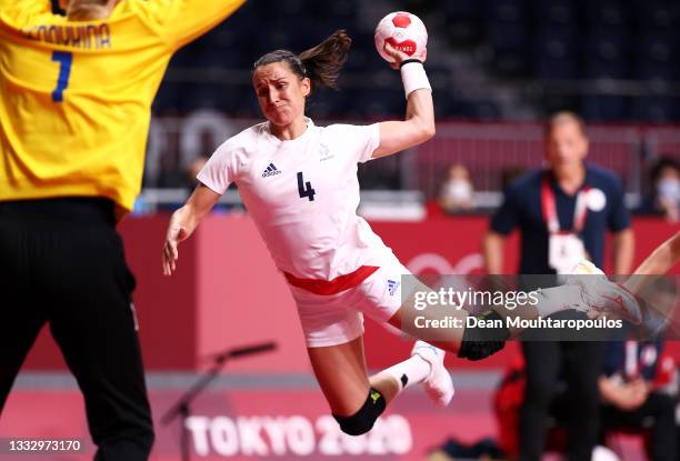 Pauline Coatanea of Team France shoots at goal as Anna Sedoykina of Team ROC looks to save during the Women's Gold Medal handball match between ROC...