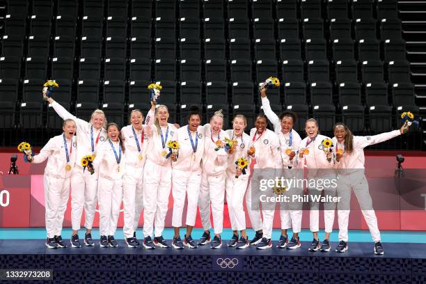 Players of Team United States react after receiving their Gold Medals during the Victory Ceremony following the Women's Gold Medal Volleyball match...