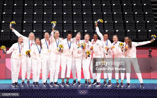 Players of Team United States react after receiving their Gold Medals during the Victory Ceremony following the Women's Gold Medal Volleyball match...
