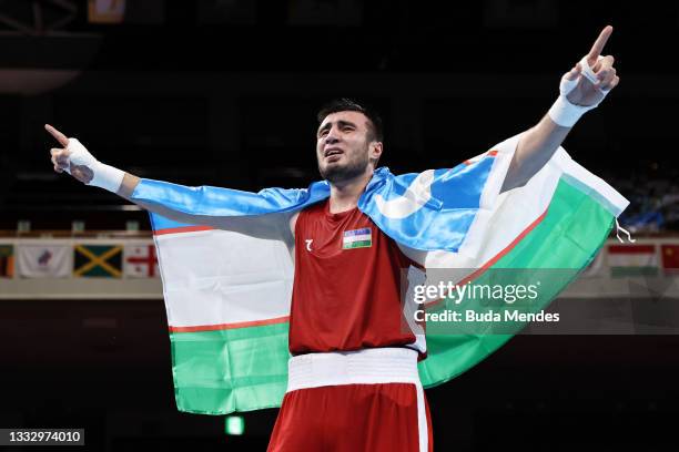 Bakhodir Jalolov of Team Uzbekistan celebrates after winning the Men's Super Heavy ( Final bout between Bakhodir Jalolov of Team Uzbekistan and...