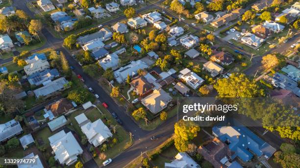 suburban sunset aerial view - districts stock pictures, royalty-free photos & images