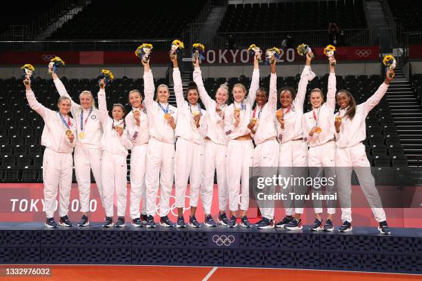 Players of Team United States react as they receive their Gold Medals during the Victory Ceremony following the Women's Gold Medal Volleyball match...