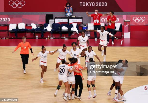 Team France celebrates defeating Team ROC 30-25 to win the gold medal in Women's Handball on day sixteen of the Tokyo 2020 Olympic Games at Yoyogi...