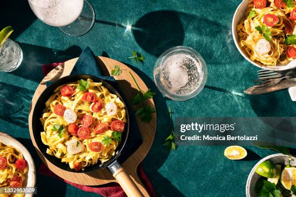 fresh pasta with tomatoes and scallop - above food stock pictures, royalty-free photos & images