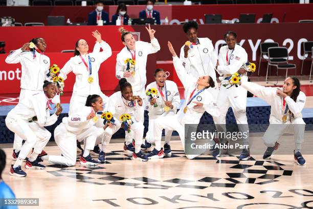 Team United States celebrates with their medals after defeating Team Japan 90-75 during the women's gold medal match between Team United States and...