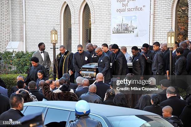 Pallbearers help carry the casket of rapper Heavy D at his funeral service at Grace Baptist Church on November 18, 2011 in Mount Vernon, New York.