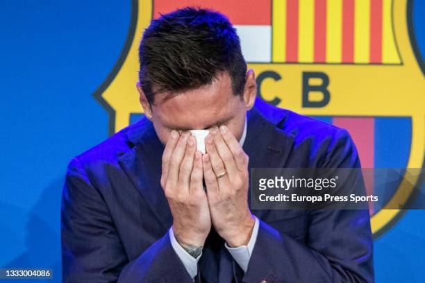 Lionel "Leo" Messi laments during his press conference to talk about his departure from FC Barcelona at Camp Nou stadium on August 08 in Barcelona,...