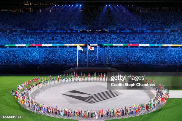 View as the flag bearers of the competing nations enter the stadium during the Closing Ceremony of the Tokyo 2020 Olympic Games at Olympic Stadium on...