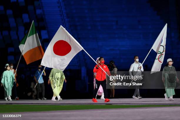 Flag bearer Ryo Kiyuna of Team Japan during the Closing Ceremony of the Tokyo 2020 Olympic Games at Olympic Stadium on August 08, 2021 in Tokyo,...