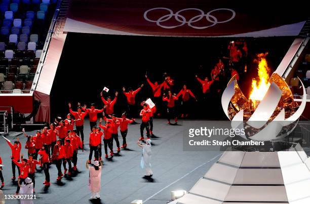 Members of Team Japan enter the stadium during the Closing Ceremony of the Tokyo 2020 Olympic Games at Olympic Stadium on August 08, 2021 in Tokyo,...
