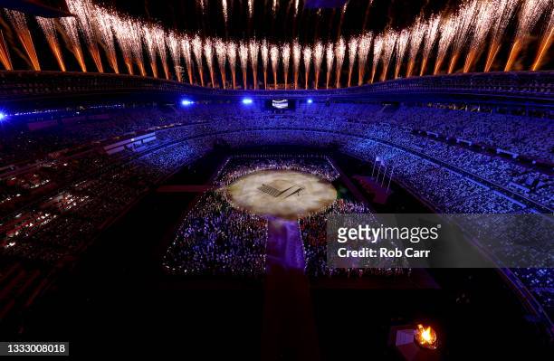 Fireworks erupt above the stadium during the Closing Ceremony of the Tokyo 2020 Olympic Games at Olympic Stadium on August 08, 2021 in Tokyo, Japan.