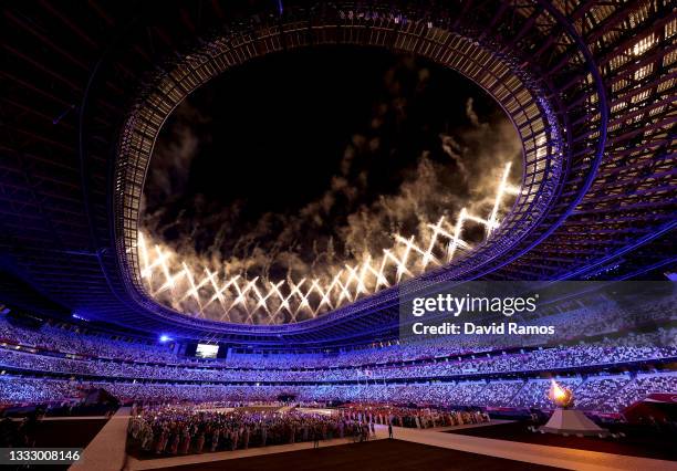 Fireworks erupt above the stadium during the Closing Ceremony of the Tokyo 2020 Olympic Games at Olympic Stadium on August 08, 2021 in Tokyo, Japan.