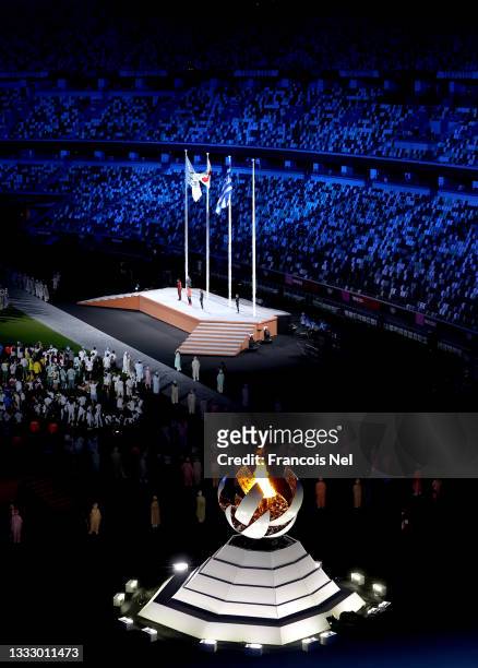 The Olympic Flame is seen during the Closing Ceremony of the Tokyo 2020 Olympic Games at Olympic Stadium on August 08, 2021 in Tokyo, Japan.