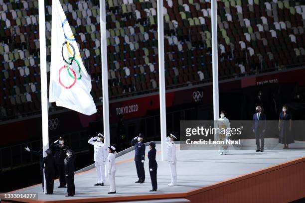 The olympic flag is lowered during the Closing Ceremony of the Tokyo 2020 Olympic Games at Olympic Stadium on August 08, 2021 in Tokyo, Japan.