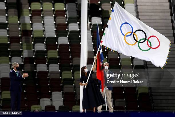 Mayor of Paris, Anne Hidalgo receives the olympic flag from President of the International Olympic Committee, Thomas Bach during the Closing Ceremony...