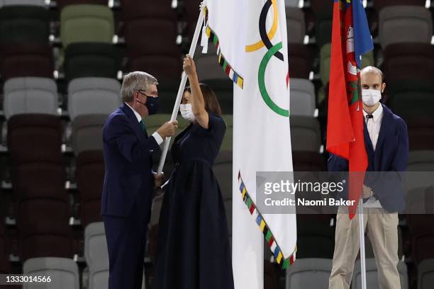 Mayor of Paris, Anne Hidalgo receives the olympic flag from President of the International Olympic Committee, Thomas Bach during the Closing Ceremony...