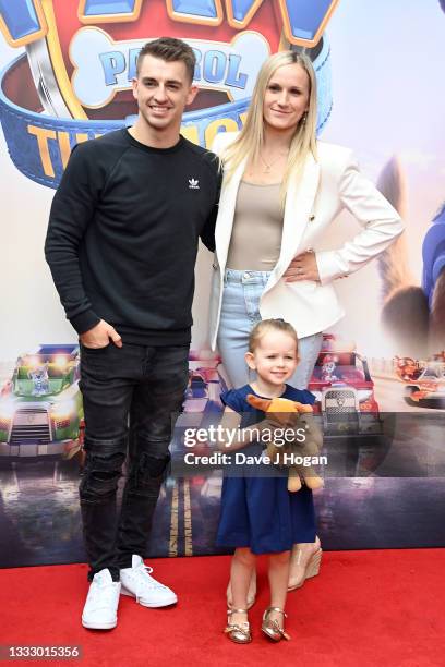 Max Whitlock, Leah Hickton and daughter Willow attend the "Paw Patrol" movie special screening at Vue Leicester Square on August 08, 2021 in London,...